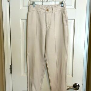 A new day cream ankle pants with cuff. Size 8